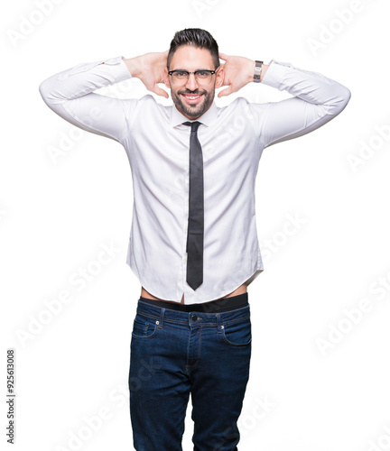 Young handsome business man wearing glasses over isolated background Relaxing and stretching with arms and hands behind head and neck, smiling happy