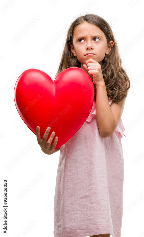 Brunette hispanic girl holding red heart serious face thinking about question, very confused idea Brunette hispanic girl holding red heart serious face thinking about question, very confused idea