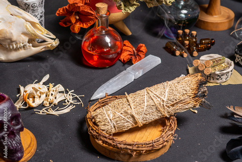 Selective focus at crystal athame, a ceremonial blade, ritual implement and magical tool used in ceremonial magic traditions. Neopagans, witchcraft, and satanic traditions. photo