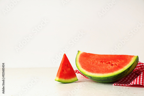 Pieces of sweet watermelon on white background