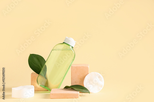 Green cosmetic bottle with ...