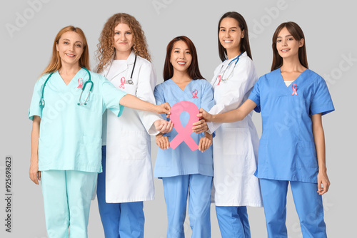 Female doctors with pink ri...