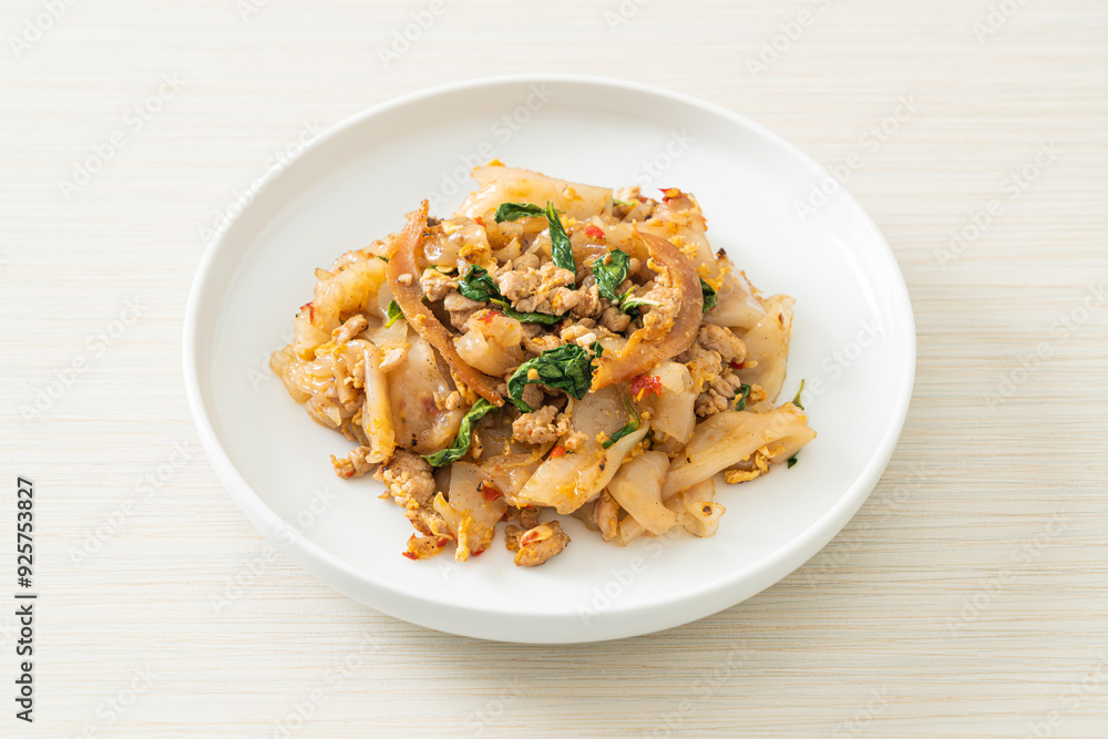 Stir-fried noodle with minced chicken and basil Stir-fried noodle with minced chicken and basil