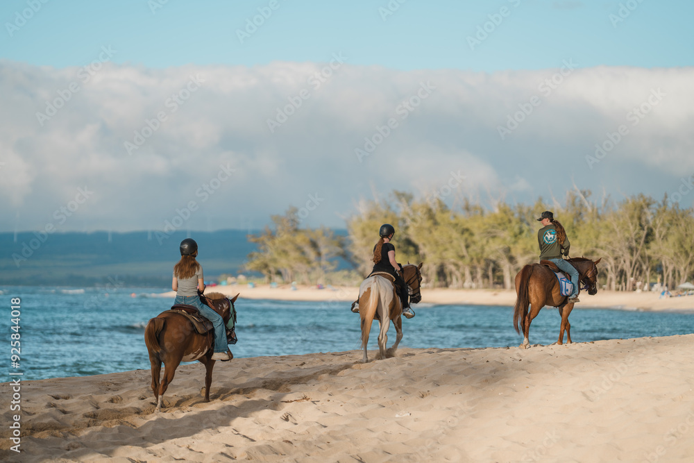Naklejka premium Hawaii Polo Oceanfront Trail Rides, Mokuleia, Honolulu, Oahu Hawaii. Horseback riding on the beach. North Shore of Oahu island. Pacific Ocean