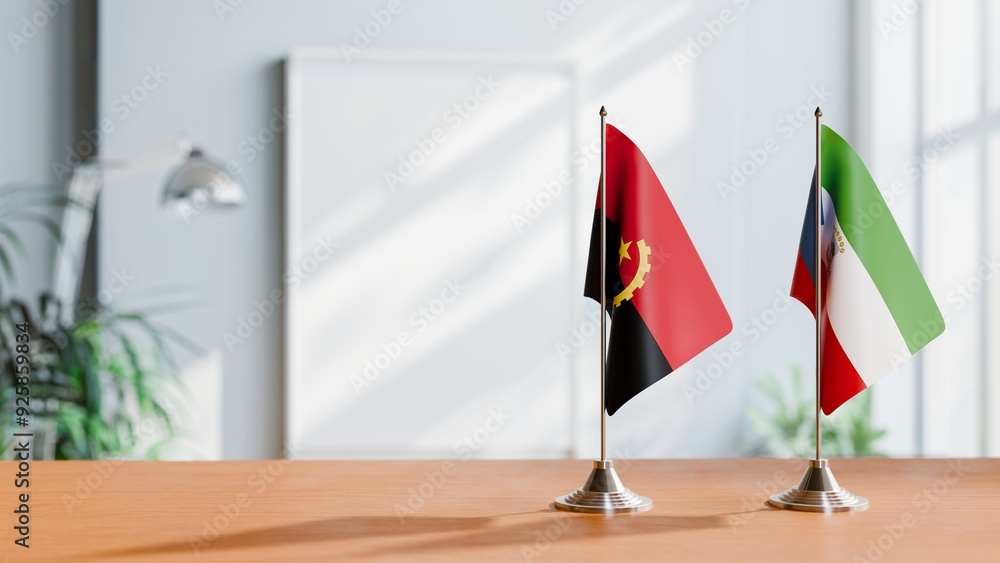 FLAGS OF ANGOLA AND EQUATORIAL GUINEA ON TABLE FLAGS OF ANGOLA AND EQUATORIAL GUINEA ON TABLE