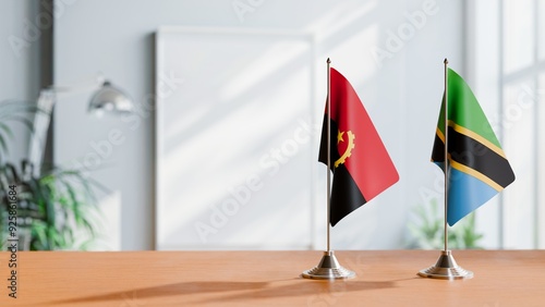 FLAGS OF ANGOLA AND TANZANIA  ON TABLE photo