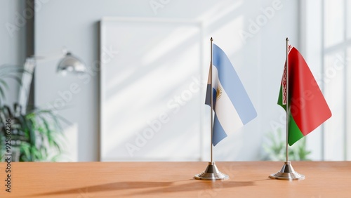 FLAGS OF ARGENTINA AND BELARUS  ON TABLE photo