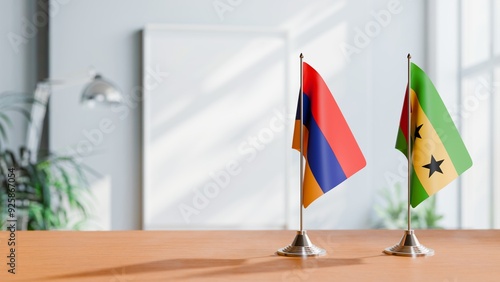 FLAGS OF ARMENIA AND SAO TOME ON TABLE