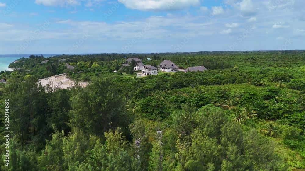Idyllic Landscape With Hotel Accommodations In Zanzibar, Tanzania, East Africa - Aerial Drone Shot Idyllic Landscape With Hotel Accommodations In Zanzibar, Tanzania, East Africa - Aerial Drone Shot