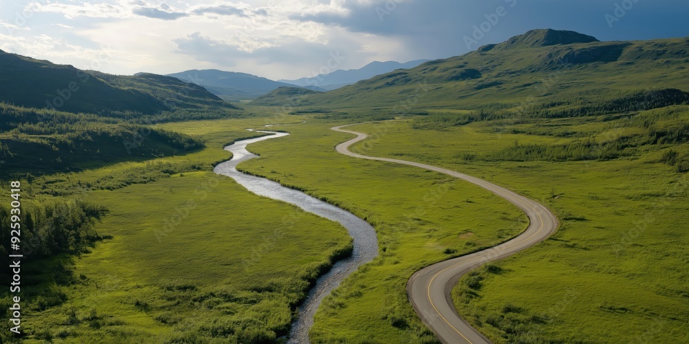 Fototapeta premium A road winds its way through a wilderness landscape setting. With copy space.