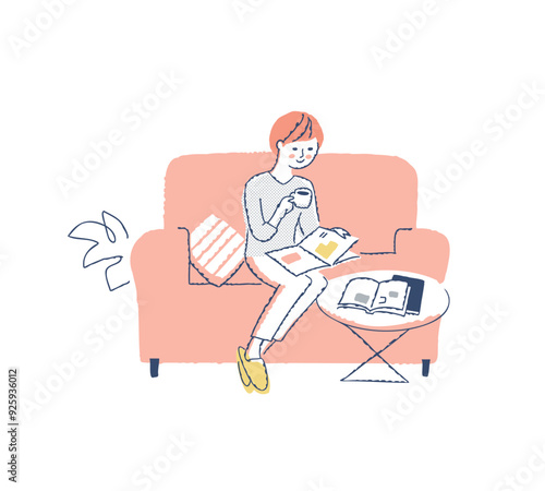 ソファーに座って雑誌を見ながらコーヒを飲んでいる女性