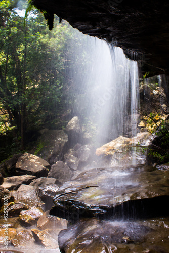 Mysterious view of Tiger falls, waterfall in the Royal natal national Park in the Drakensberg Mountains of South Africa, from behind.  photo