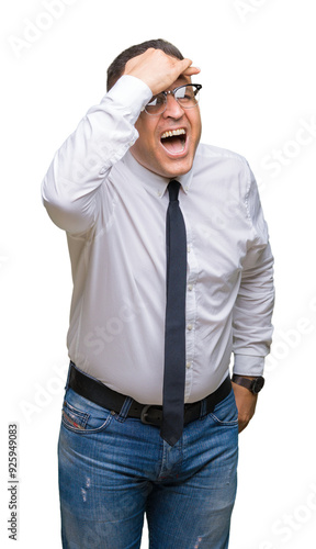 Middle age bussines arab man wearing glasses over isolated background very happy and smiling looking far away with hand over head. Searching concept.