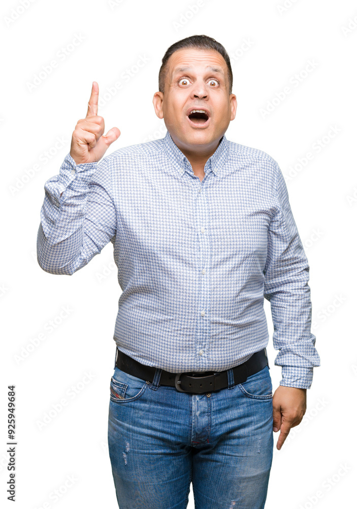 Middle age arab business man over isolated background pointing finger up with successful idea. Exited and happy. Number one. Middle age arab business man over isolated background pointing finger up with successful idea. Exited and happy. Number one.