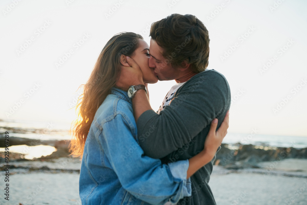 Beach, kiss and couple with love, romance and happiness with anniversary, vacation and relationship. Seaside, hug and man with woman, marriage and getaway trip for honeymoon, nature and affection Beach, kiss and couple with love, romance and happiness with anniversary, vacation and relationship. Seaside, hug and man with woman, marriage and getaway trip for honeymoon, nature and affection