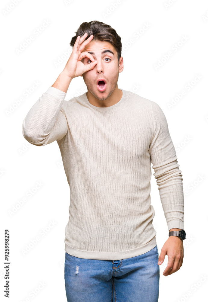 Young handsome man over isolated background doing ok gesture shocked with surprised face, eye looking through fingers. Unbelieving expression. Young handsome man over isolated background doing ok gesture shocked with surprised face, eye looking through fingers. Unbelieving expression.