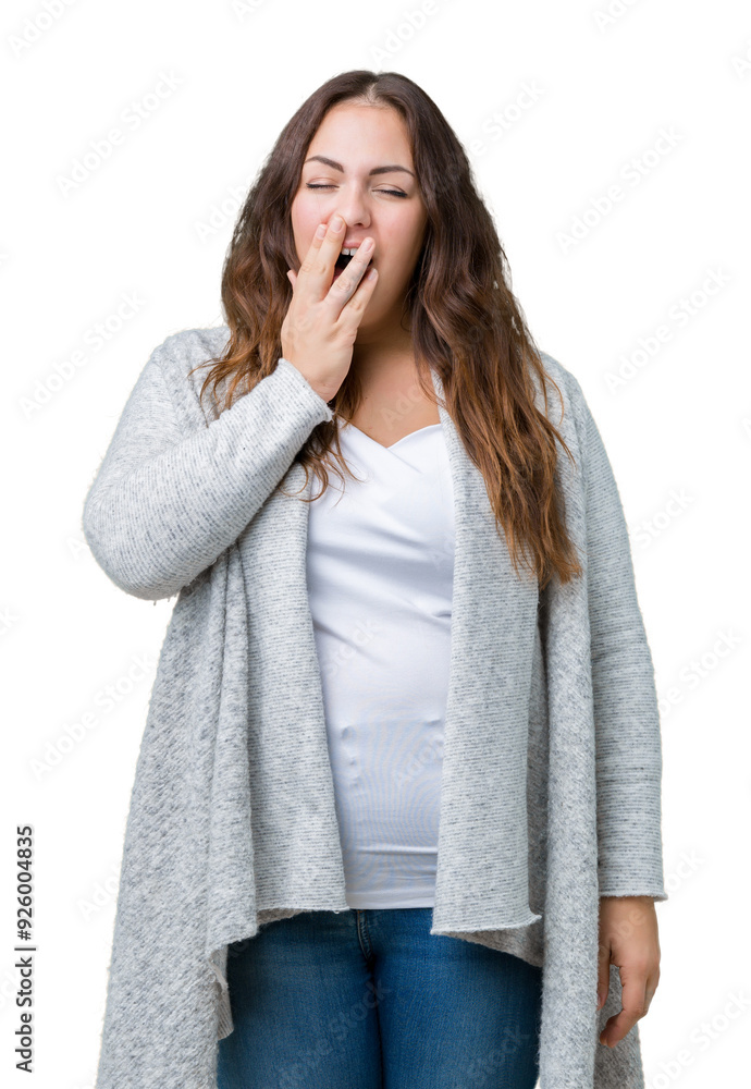 Beautiful plus size young woman wearing winter jacket over isolated background bored yawning tired covering mouth with hand. Restless and sleepiness. Beautiful plus size young woman wearing winter jacket over isolated background bored yawning tired covering mouth with hand. Restless and sleepiness.