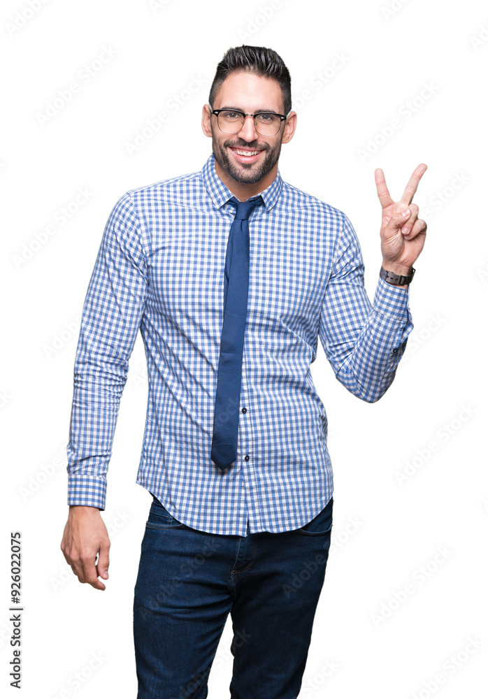 Young business man wearing glasses over isolated background smiling with happy face winking at the camera doing victory sign. Number two. Young business man wearing glasses over isolated background smiling with happy face winking at the camera doing victory sign. Number two.