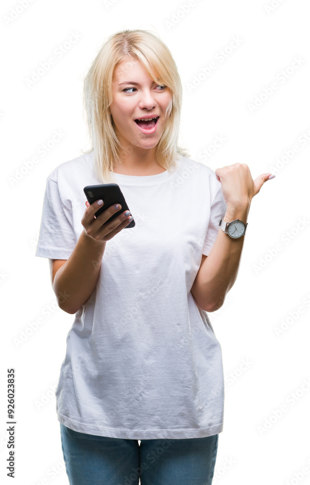 Young beautiful blonde woman using smartphone over isolated background pointing and showing with thumb up to the side with happy face smiling Young beautiful blonde woman using smartphone over isolated background pointing and showing with thumb up to the side with happy face smiling