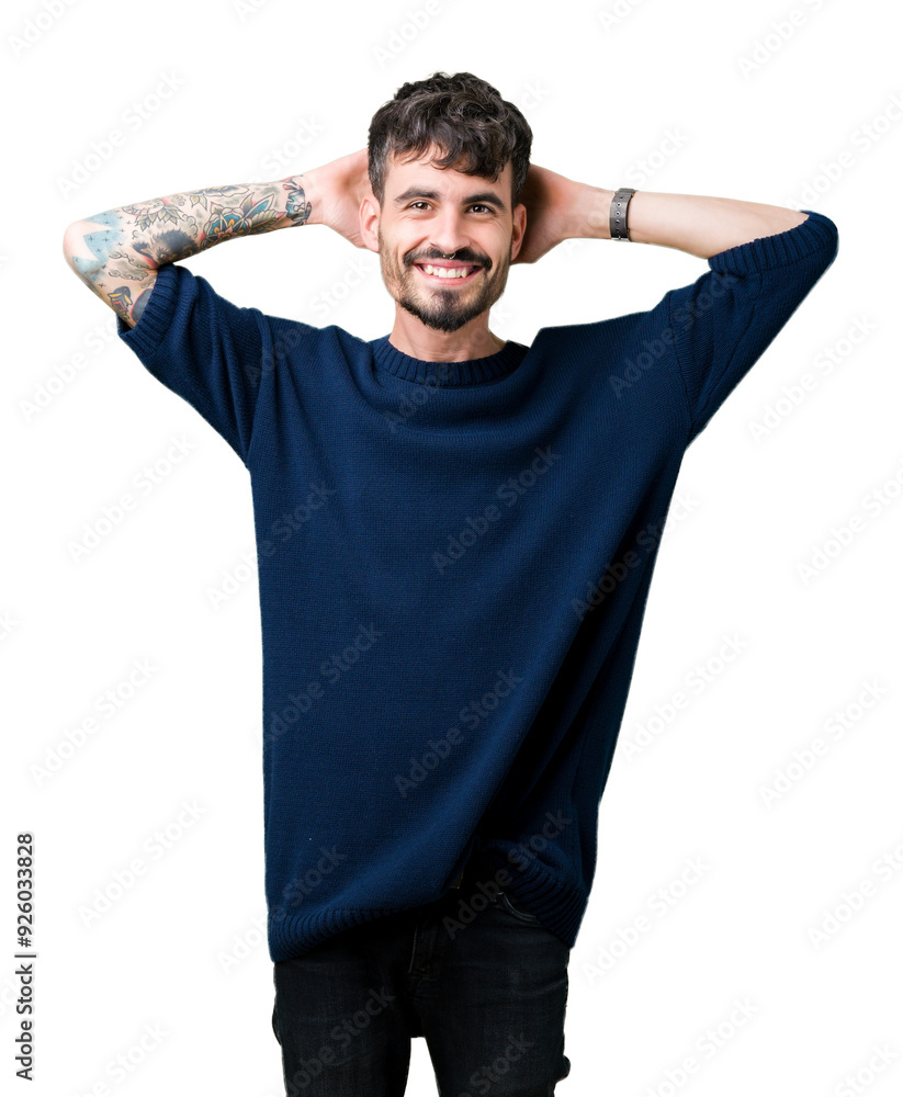 Young handsome man over isolated background Relaxing and stretching with arms and hands behind head and neck, smiling happy Young handsome man over isolated background Relaxing and stretching with arms and hands behind head and neck, smiling happy