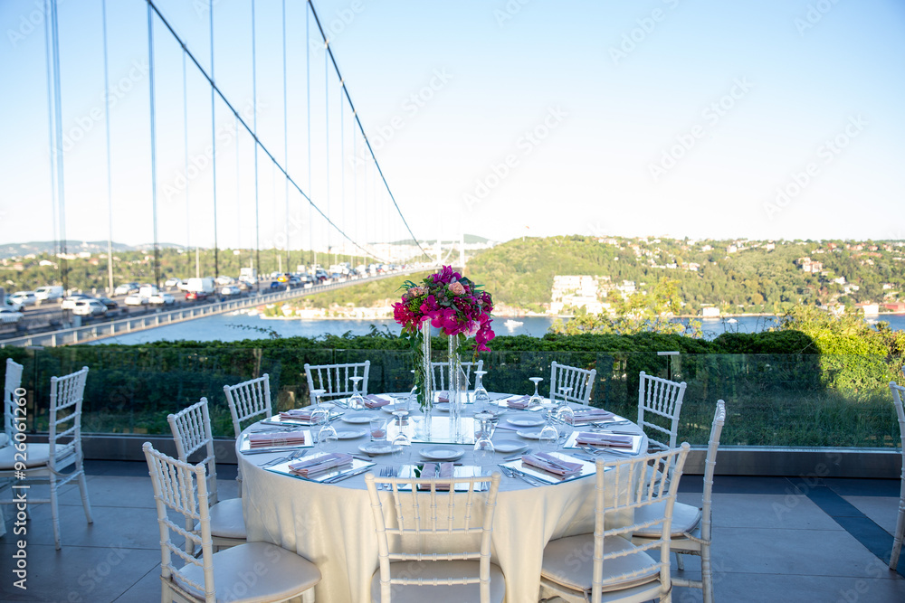 Indoor Wedding Reception: Round Table with White Flowers and Crystal Accents