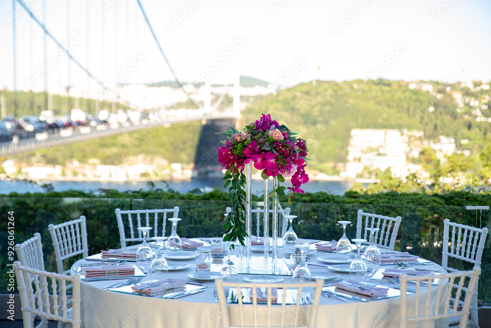 Indoor Wedding Reception: Round Table with White Flowers and Crystal Accents