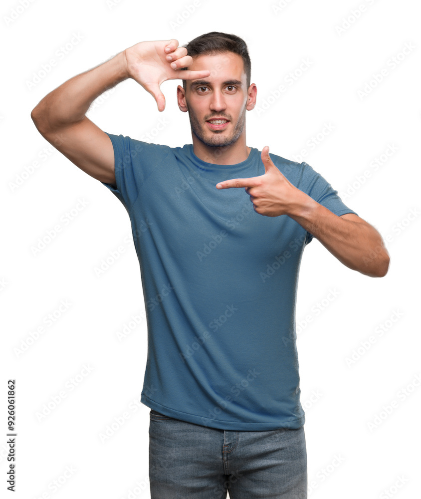 Handsome young casual man smiling making frame with hands and fingers with happy face. Creativity and photography concept. Handsome young casual man smiling making frame with hands and fingers with happy face. Creativity and photography concept.
