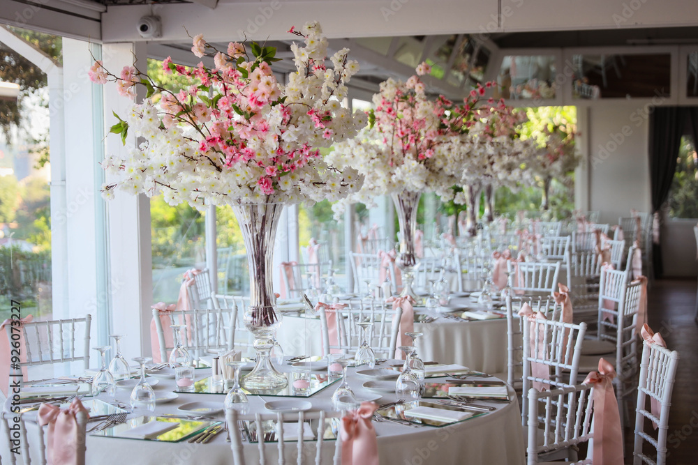 Indoor Wedding Reception: Round Table with White Flowers and Crystal Accents