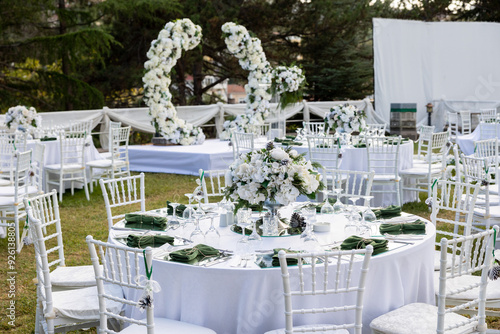Luxury Wedding Venue: Beautifully Decorated Outdoor Space with Floral Arrangements