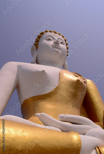 Big sacred statue, Large buddha statue enshrined in Wat Phra That Doi Kham (Temple of the Golden Mountain), Chiang mai, Thailand photo