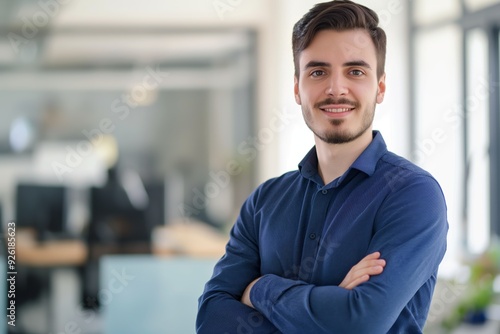 Portrait of a Focused IT Specialist in Business Casual Smiling at the Camera