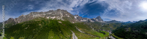 Aerial view of Mount Cervino, The Matterhorn, seen from Breuil-Cervinia. Green valleys and waterways that descend from the glaciers