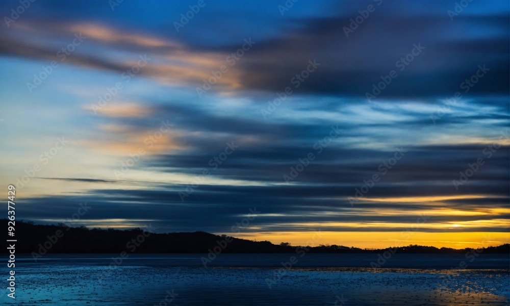 Obraz premium sunset over the river