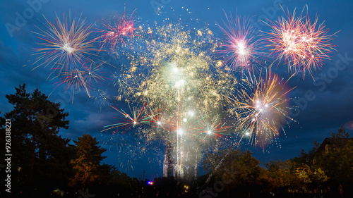 Fireworks. 
Group of people watching the fireworks.
French National Day in Soissons photo