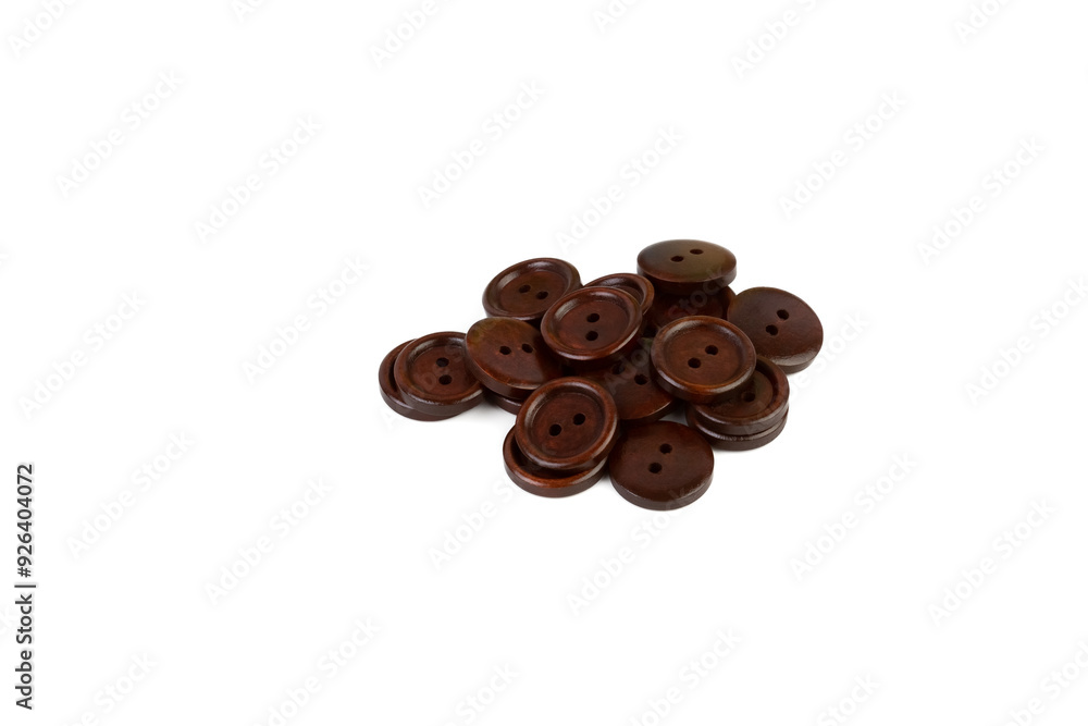 Dark brown wooden buttons on a white background