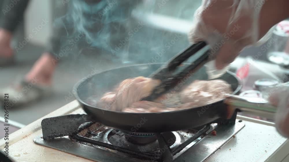 Close-up frying chicken thighs in a frying pan. Close-up of fried chicken meat, 4k footage. Close-up frying chicken thighs in a frying pan. Close-up of fried chicken meat, 4k footage.