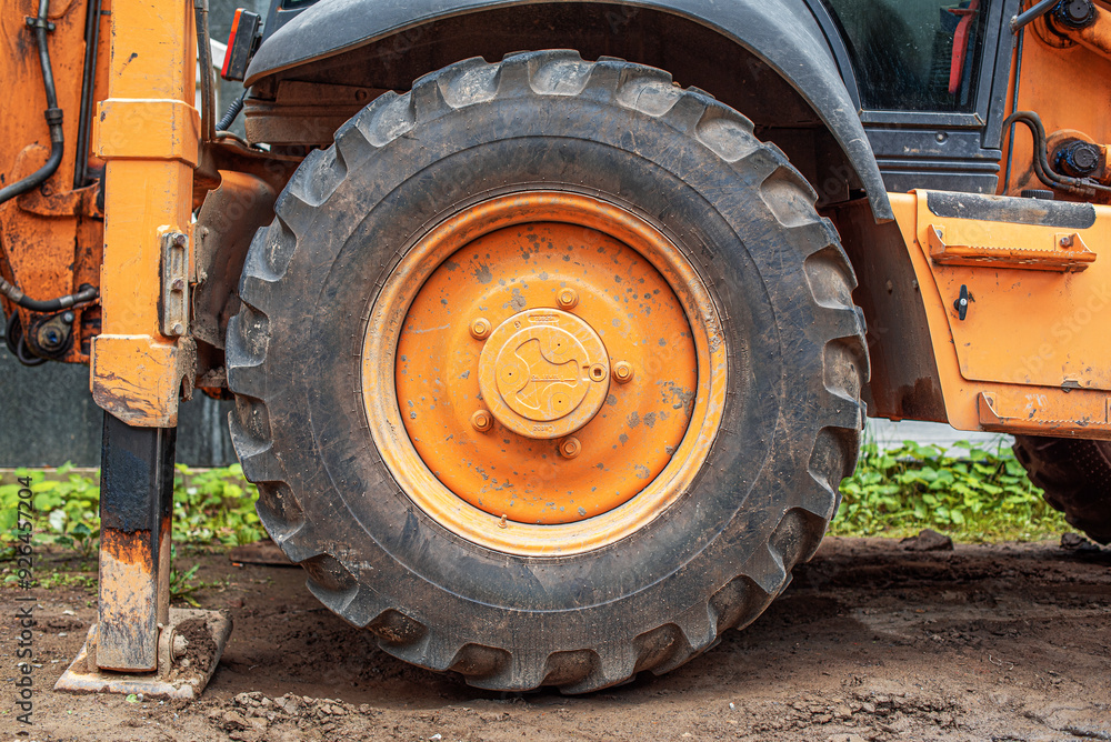 Close-up of a construction tractor wheel. Close-up of a construction tractor wheel.