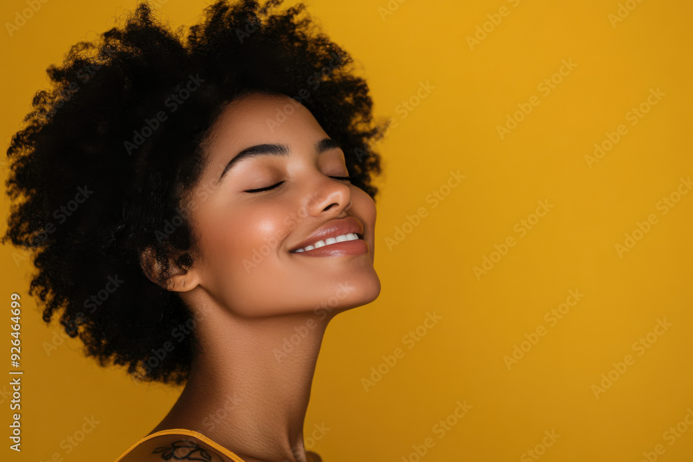 A close up of a tattooed black woman's face with her eyes closed A close up of a tattooed black woman's face with her eyes closed
