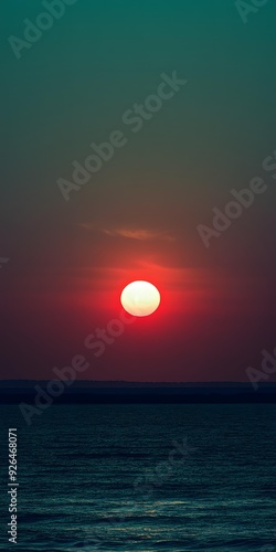 Sunset Over Ocean With Dark Blue Skies