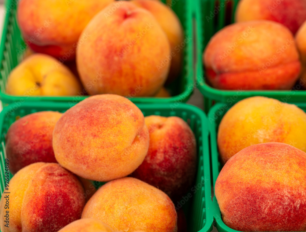 fresh peaches in baskets
