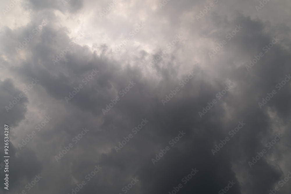 Gray clouds in bad weather. Sky background. Gray clouds in bad weather. Sky background.