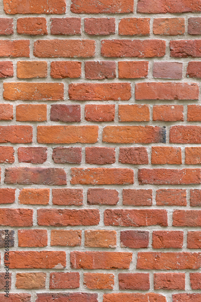 Close-up of a red brick wall. rough, aged bricks. Background and texture Close-up of a red brick wall. rough, aged bricks. Background and texture