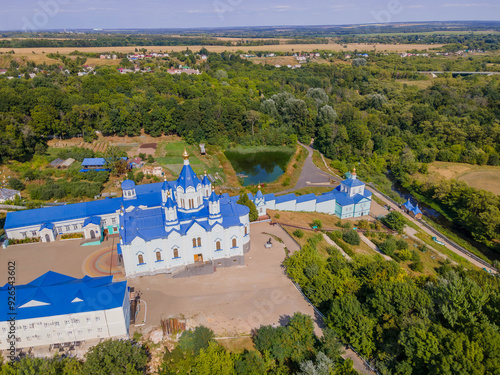 The aerial photo of Korennaya Pustyn monastery in Kursk oblast of Russia, a Christian Orthodox temple with the beautiful Russian nature around.
 photo