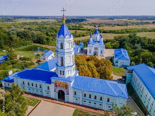 The aerial photo of chapel tower at Korennaya Pustyn monastery in Kursk region (Kursk oblast) of Russia with the panoramic view and Russian nature.
 photo