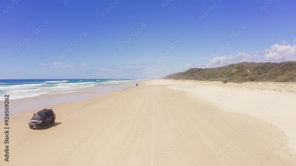 Drone, cars and driving on sand by beach for adventure, fun on racing on vacation in Mozambique. Summer, holiday and travel destination for coastal view, peace and clean air with ocean, waves or sea Drone, cars and driving on sand by beach for adventure, fun on racing on vacation in Mozambique. Summer, holiday and travel destination for coastal view, peace and clean air with ocean, waves or sea