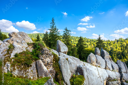 Tustan fortress in Skhidnytsia, Lviv region, Ukraine. Rocks of Dovbush. A beautiful view of the autumn mountain panorama. photo