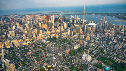 Photography Aerial view of Toronto skyline from helicopter on a beautiful summer sunset, Ont