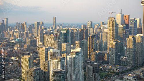 Photography Aerial view of Toronto skyline from helicopter on a beautiful summer sunset, Ont