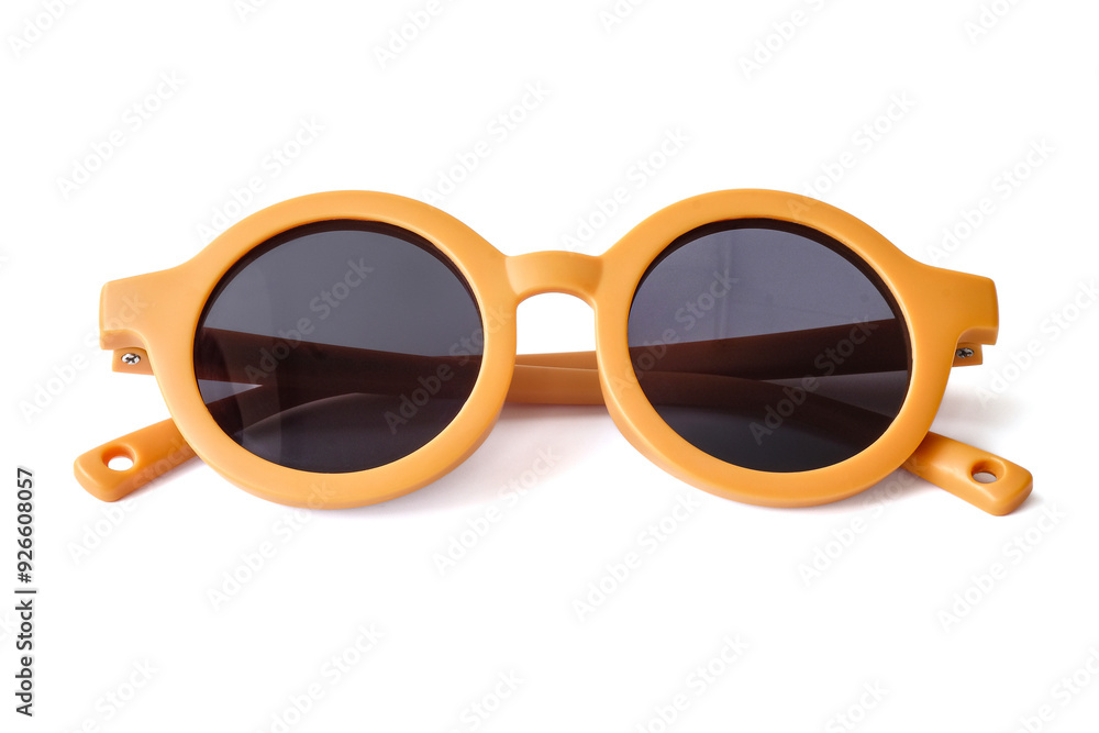 Yellow kids sunglasses close up on white background.