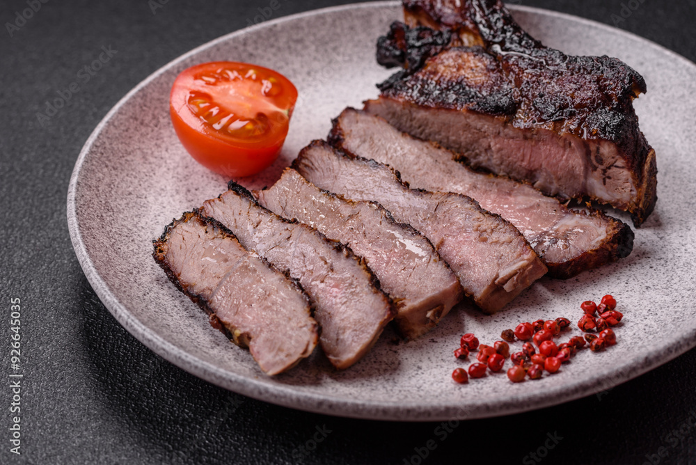 Juicy grilled beef tomahawk steak with salt, spices and herbs Juicy grilled beef tomahawk steak with salt, spices and herbs
